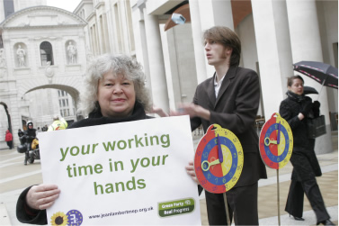 Jean with a working time banner